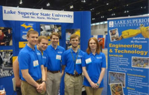 LSSU Students selected to attend Automate 2015 pictured in front of LSSU’s conference booth. From left to right: Trace Hill, Eugene Peyerk, Blake Dansfield, Tyler Fontana, and Kerry Pierce.